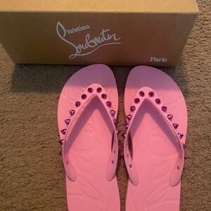 LV pink studded flip flops